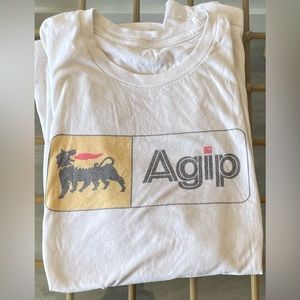 Large white and yellow Agip graphic tee.